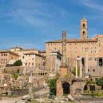 Explore the historic Roman Forum with ancient ruins under a clear blue sky in Rome, Italy., tags: dna-studien die von britannien - pexel